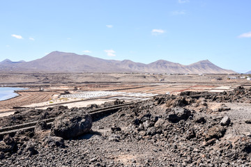 Wall Mural - Lanzarote saltworks salinas de Janubio colorful Canary Islands