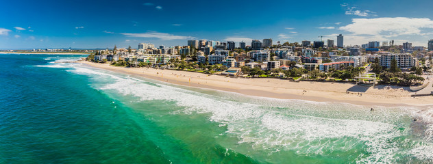 Aerial panoramic image of ocean waves on a Kings beach, Caloundra, Australia