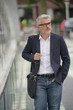 © goodluz - Businessman walking to work