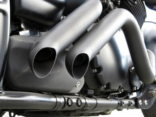Motorcycle Engine Exhaust Pipes Close-up. Motor Bike Exhaust Pipes