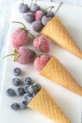 Wall Mural - Frozen berries in waffle cones