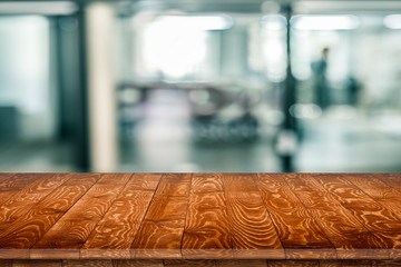 Wall Mural - empty wooden table perspective for product placement or montage with focus to table. wooden board su