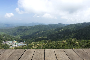 Vintage wood plank, floor, table perspective view from mountain with blue sky for background for display - mockup