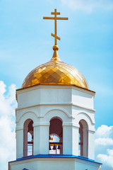 Orthodox cross on the dome of church