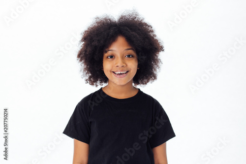 Cute And Happy African American Kid Smiling And Laughing