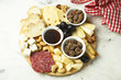 © marysckin - Assorted appetizers on desk. Cheeses, pate, honey, nuts
