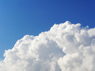 huge white cloud in the blue sky