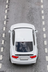 Canvas Print - sports car on a road view from above