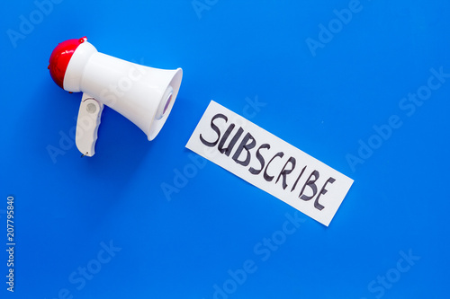 Download Subscribe Template Or Mockup Hand Lettering Subcribe Near Megaphone On Blue Background Top View Space For Text Stock Photo Adobe Stock