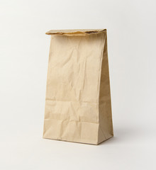 Wall Mural - Blank brown paper bag for mockup template advertising and branding background.