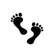 © Salamatik - Black silhouette. Human footprint. Icon. Isolated on white background. Vector
