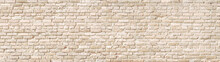 Beige Old Brick Wall Panorama.