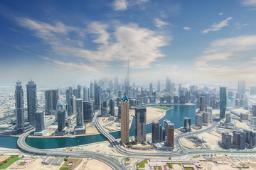 Wall Mural - Aerial view of modern city skyscrapers in Dubai, UAE.