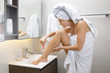 © blackday - Woman is shaving her legs