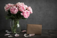 Creative Mock Up With A Beautiful Bouquet Of Pink Peony Flowers And Vintage Notebook With Place For Text