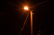 Street lamp shining at night in township
