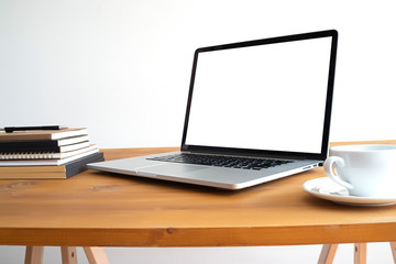Wall Mural - laptop with blank screen on table. workspace background new project on laptop computer with blank co