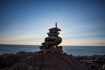 Rock Cairn with ocean and sunset