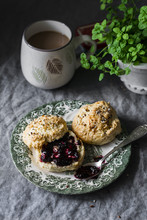 Delicious Breakfast Or Brunch - Scones With Butter And Jam And Coffee On A Cozy Home Table