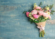 Bouquet of beautiful fragrant flowers on wooden background