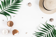 Summer Composition. Tropical Palm Leaves, Hat, Coconut On White Background. Summer Concept. Flat Lay, Top View, Copy Space