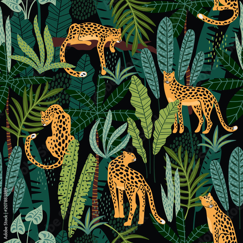 Fotografía Vestor seamless pattern with leopards and tropical leaves.