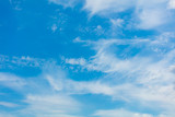 Fototapeta Łazienka - Clouds on a blue sky as a background