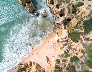 Wall Mural - Aerial view of exotic sandy beach and ocean with clear turquoise water.