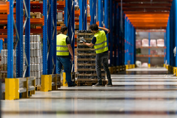 Wall Mural - Workers working in warehouse