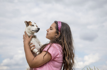 Pretty Girl In the Park with her dog