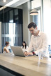 © Andy Paul - Colleagues in an office
