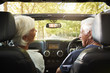 © Monkey Business - Senior Couple Drive Open Top Car On Countryside Road Trip