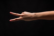 © Prostock-studio - Female hand shows number two isolated at black