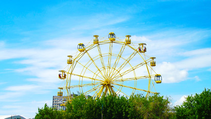 Rest in the amusement Park.Ferris wheel.