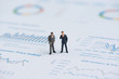 business miniature people on business graph