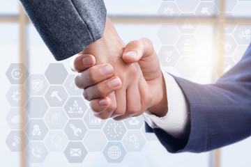 Wall Mural - Handshake of two businessmen .