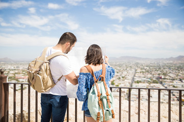 Couple tourist traveling and using map