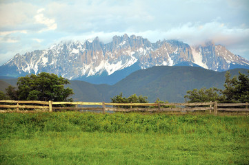 Wall Mural - Scenic view of Dolomites mountain range on summer