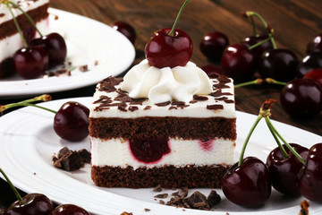 Chocolate cake with cherries and whipped cream. Black Forest cake