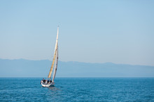 Sailboat In An International Yacht Race On Open Water