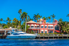 Yacht At Coastal Mansion