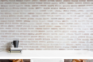 Mockup books and coffee mug on white desk. for product display montage