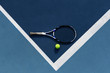 © Milles/Stocksy - Tennis ball and racket on corner of court