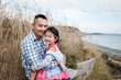 © aremafoto/Stocksy - Portrait of Asian Father and Daughter Outdoor