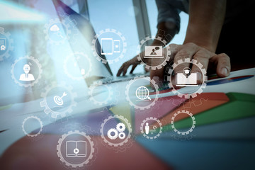 Poster - business documents on office table with smart phone and digital tablet and graph business diagram and man working in the background