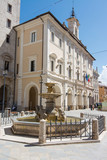 Fototapeta Paryż - Tourist view of Rieti, in Lazio, Italy. The Town Hall and Fountain of the dolphins.