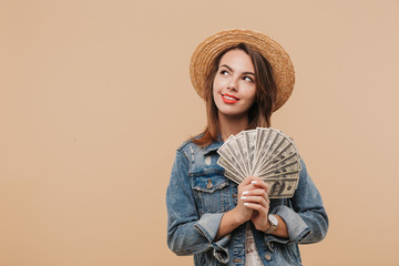 Wall Mural - Portrait of a smiling young girl in summer clothes