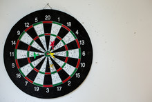 Darts Is Hanging On The White Wall. Entertainment Games For Indoor Activity.