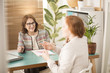 © Photographee.eu - Smiling advisor and burnout employee