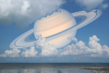 Wall Mural - Saturn back cloud  sky on sea ,concept Saturn near Earth